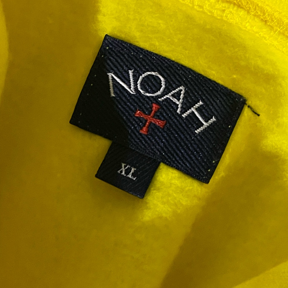 Noah NYC Yellow Hoodie with Black Logo and Red Cross - Picture 2 of 3